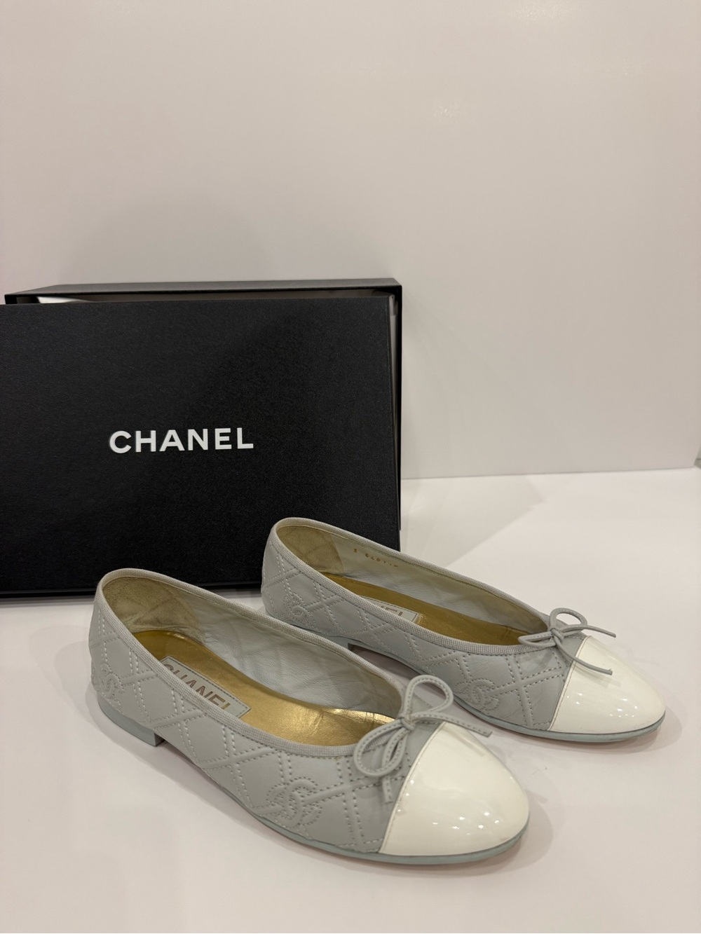 100% AUTHENTIC CHANEL Blue Gray Quilted Leather Ballet Flats with White Cap Toe